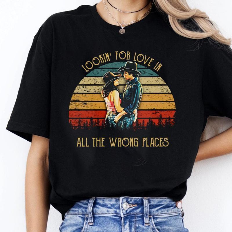 Bud And Sissy Looking For Love In All The Wrong Places Shirt, Retro 80s Country Movie Quote Tee, Vintage Romance Unisex T-Shirt, Cowboy Couple Gift